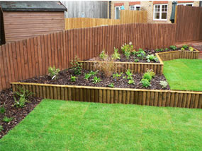 sloping garden design garden completed - borders